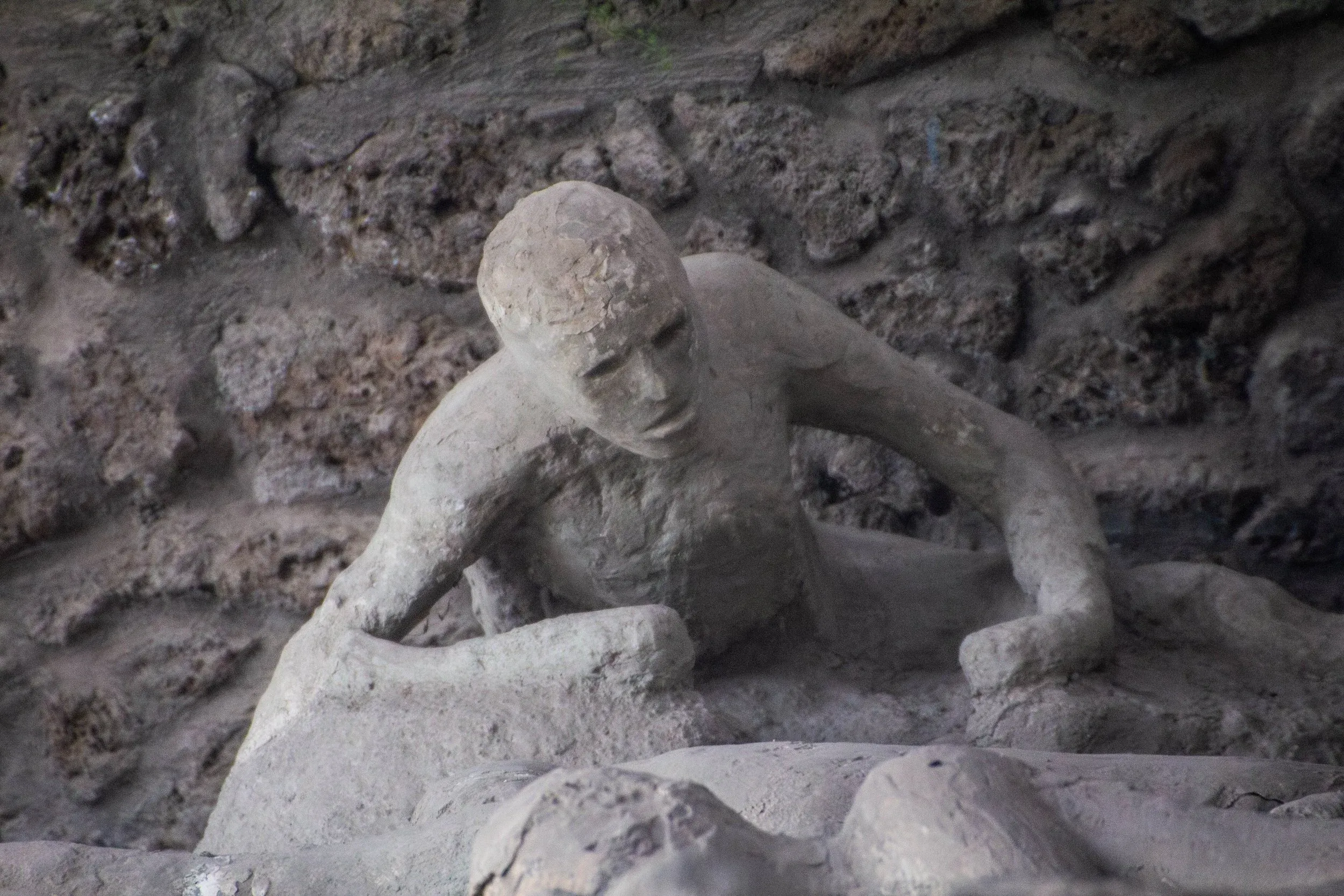 Pompeii plaster casts displayed in archaeological context